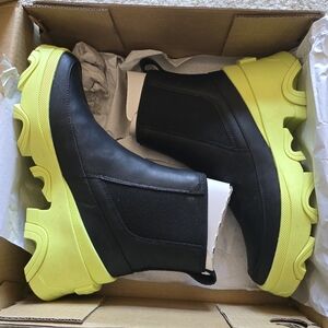 Sorel Black and Neon Yellow Chelsea Boots